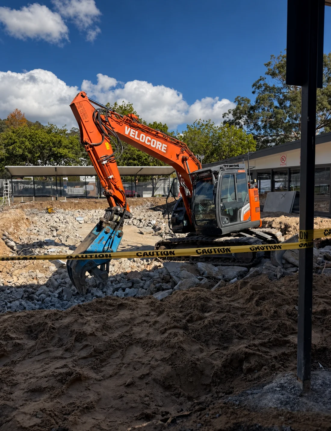 Excavator working on a demolition site